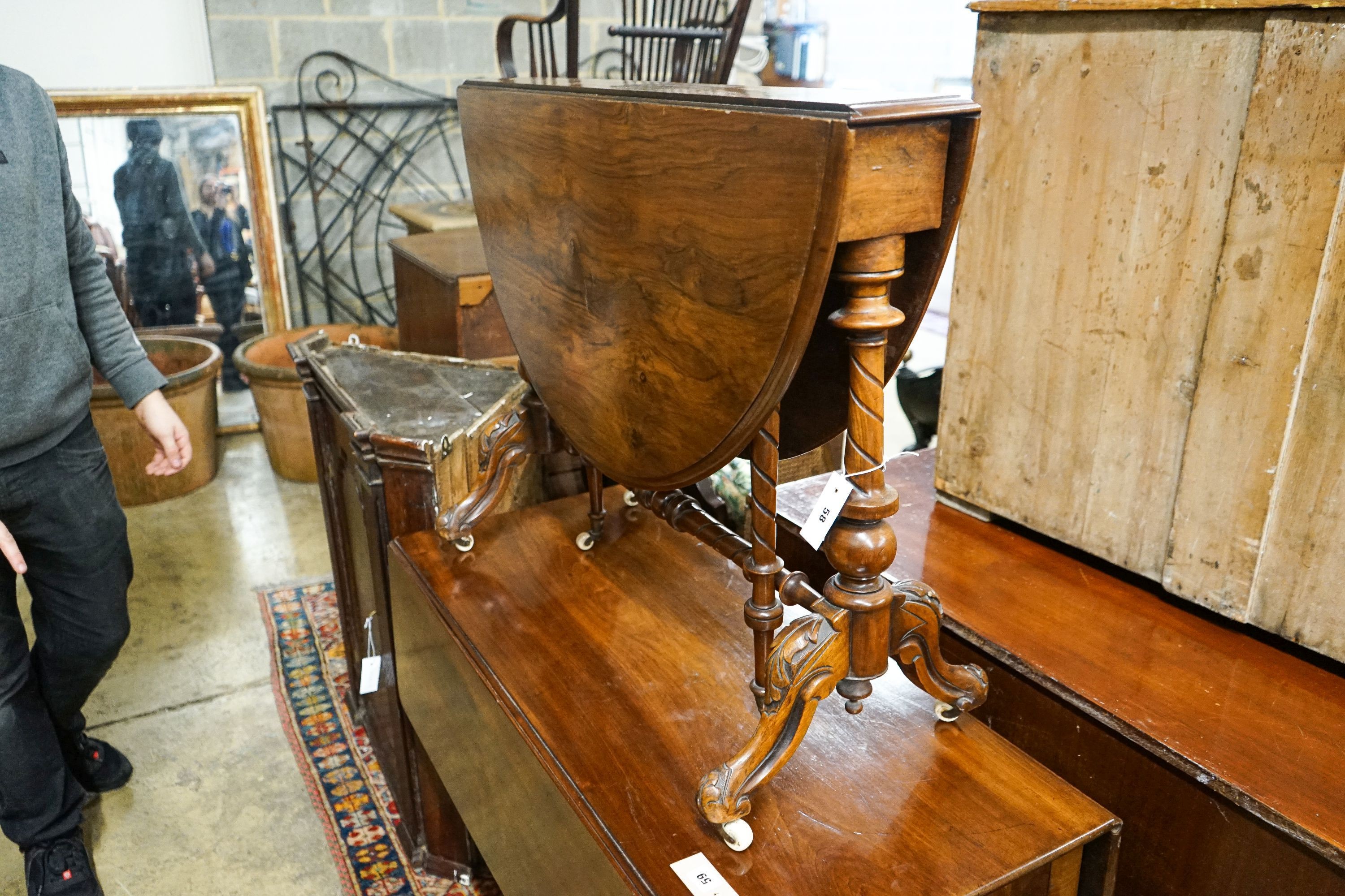 A Victorian walnut Sutherland table, width 90cm, height 71cm